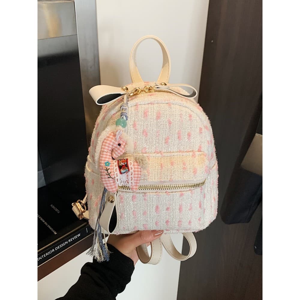 Moda na moda pequena mochila feminina 2025 novo estilo versão coreana lazer viagem mochila de lã All-Match portátil pequ