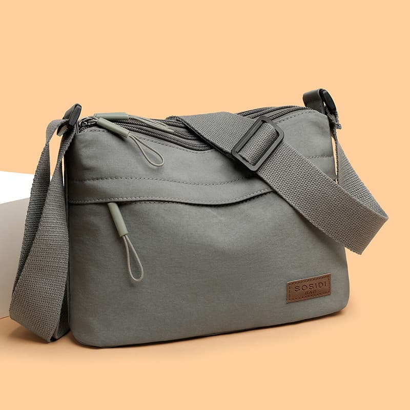 2025 novo estilo multi-camada saco do mensageiro Casual All-Match multi-bolso portátil saco de pano repelente de água um
