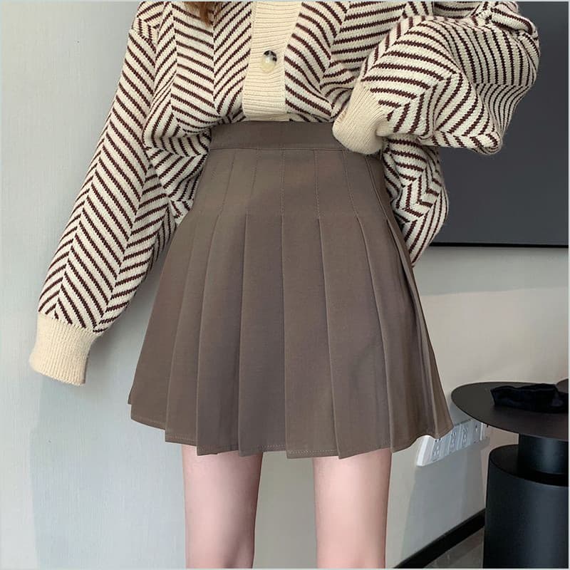 Saia plissada feminina outono inverno saia 2021 novo estilo cintura alta Hip a linha saia pequena jk saia curta com cami