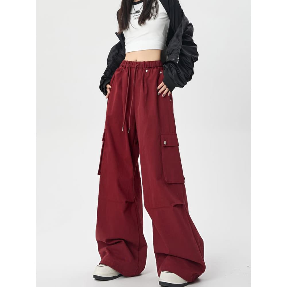 Retro vinho vermelho americano macacão feminino primavera outono 2026 novo estilo cintura alta mais magro olhar solto Ca