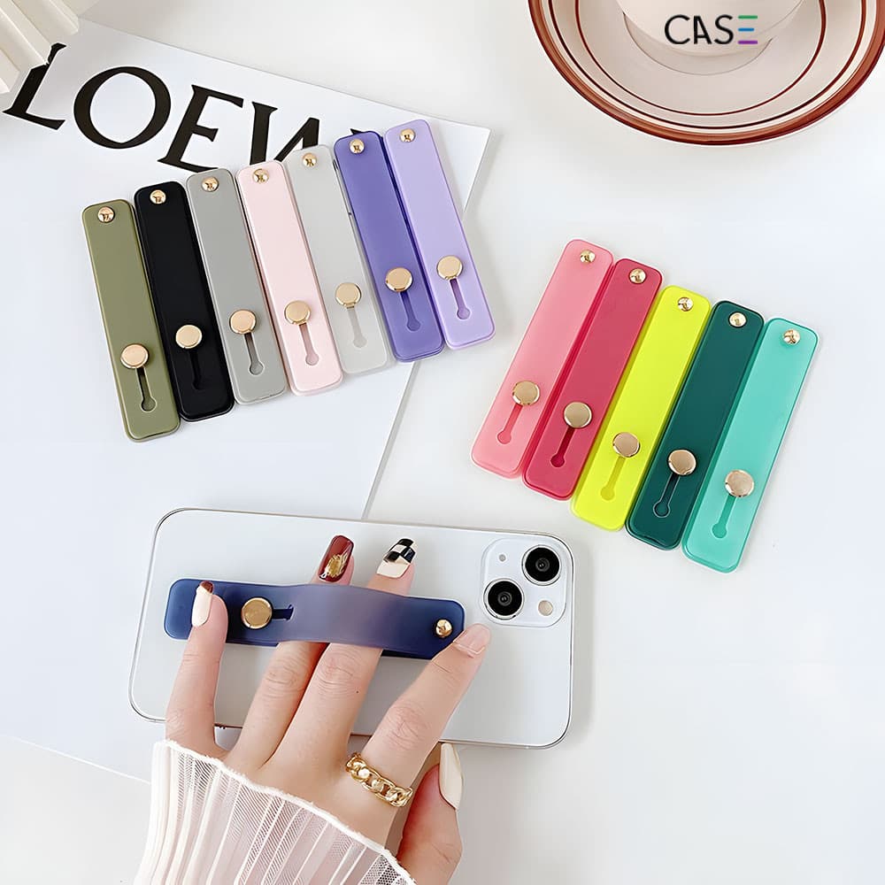 Suporte de Pulseira Adesivo Para Capa de Celular Silicone Multifuncional Vários Cores e Modelos Disponíveis KZJ003