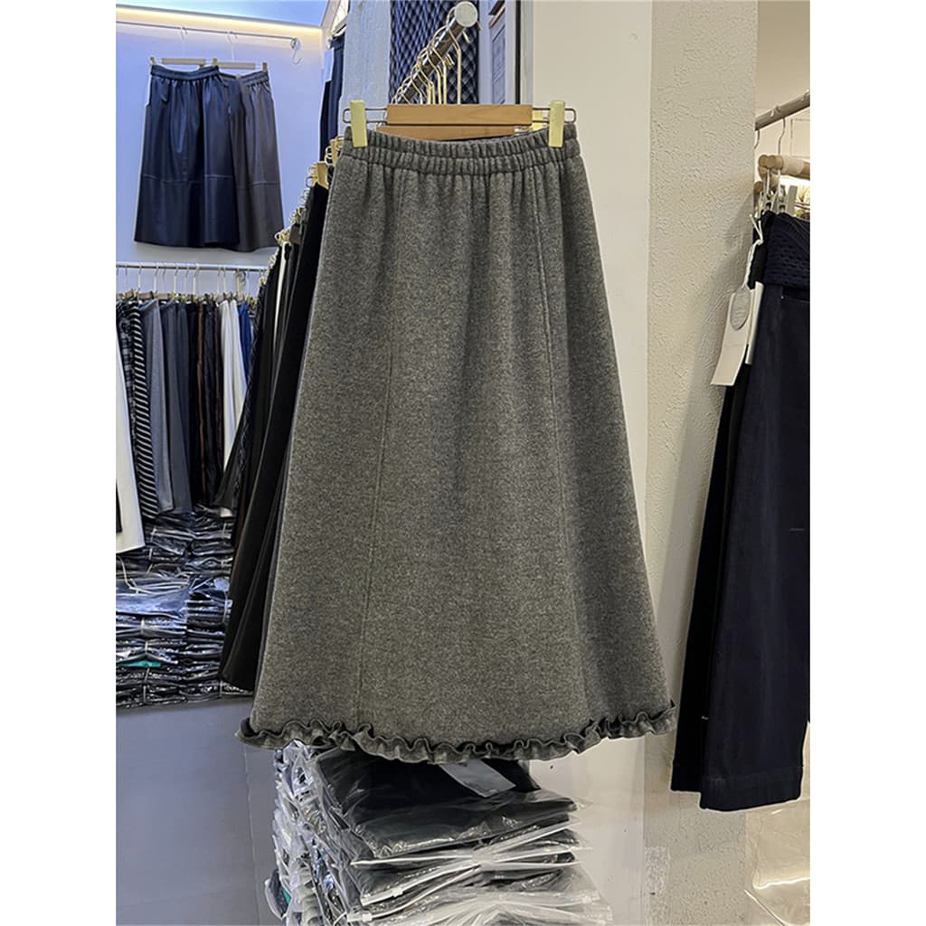 Mais fino olhar solto forro de lã fungo borda saia longa feminina 2026 inverno novo estilo Casual lã A linha busto saia