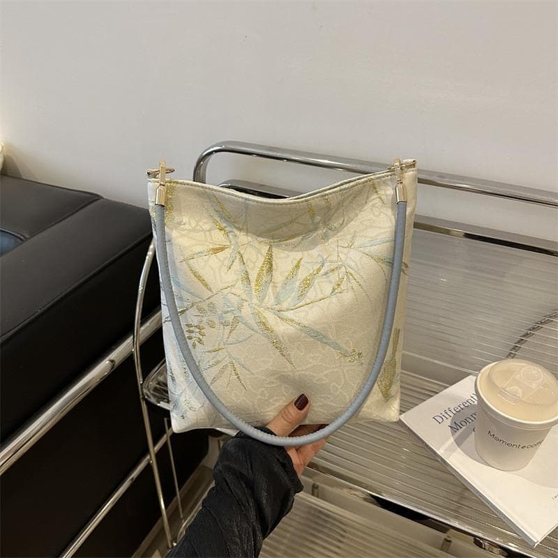Estilo chinês estilo chinês bordado saco feminino 2025 novo estilo simples na moda de um ombro axila saco Commuter bolsa