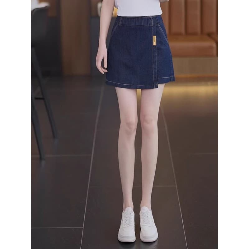 Culottes jeans assimétricos femininos 2025 verão novo estilo cintura elástica All-Match a linha falso Shorts retos escur