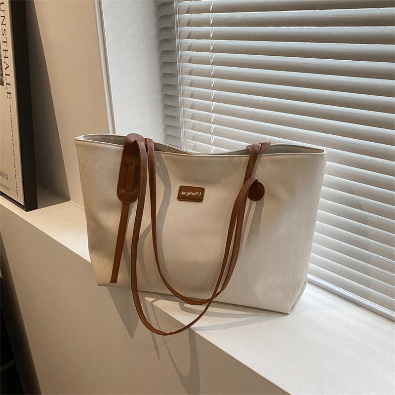 Bolsa Popular de grande capacidade deste ano feminina 2025 novo estilo bolsa mensageiro de couro macio textura de nicho