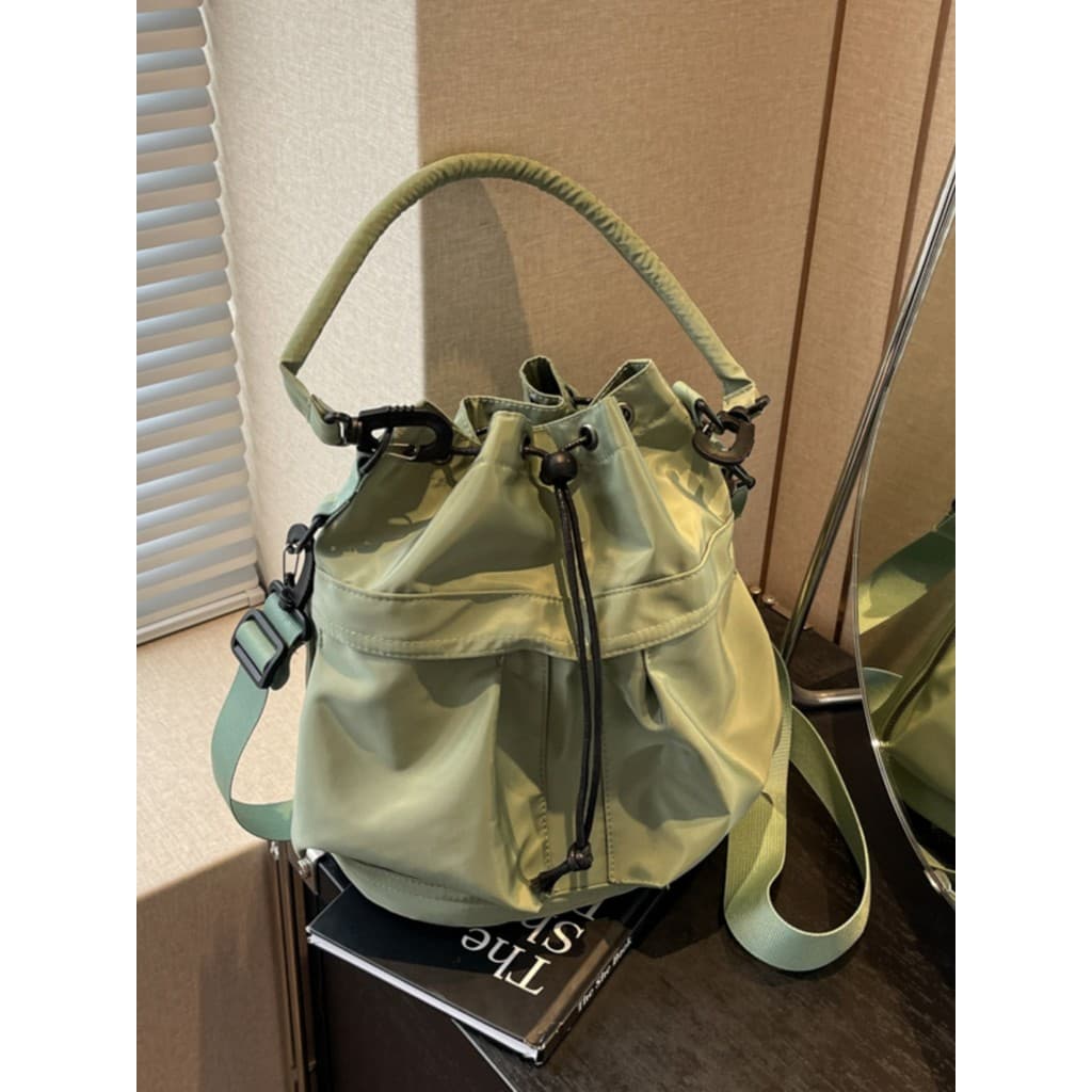 Grande capacidade versão coreana moda náilon pano cordão balde saco Casual único Multi-bolso portátil de um ombro saco d