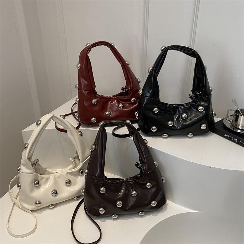 Rebites único elegante 2025 elegante portátil axilas Baguette saco High-End Retro Commuter ombro mensageiro saco feminin