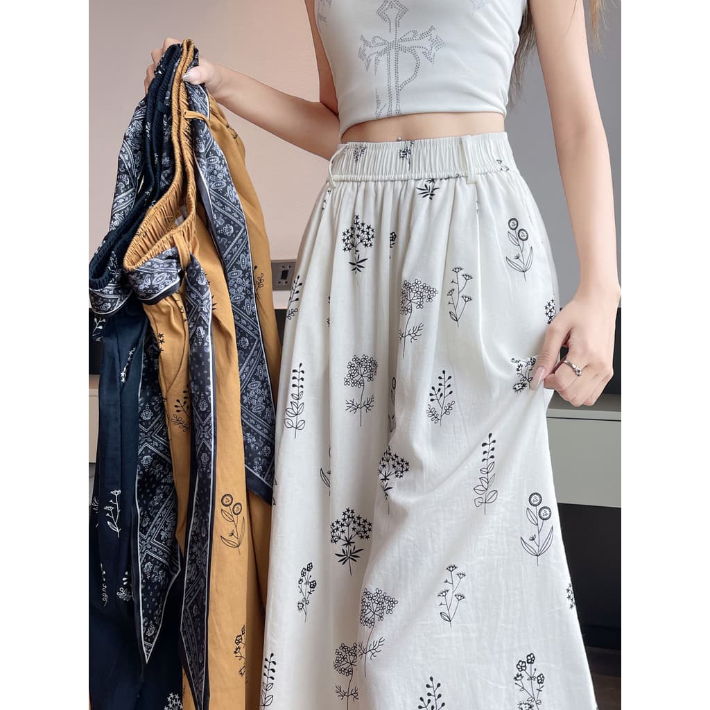 Calças estampadas brancas femininas verão estilo fino Popular deste ano seda gelo algodão linho calças largas amarradas