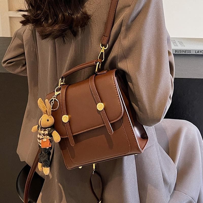 Mochila pequena feminina Design nicho mochila senhoras 2025 novo estilo bonito moda High-End saco do mensageiro