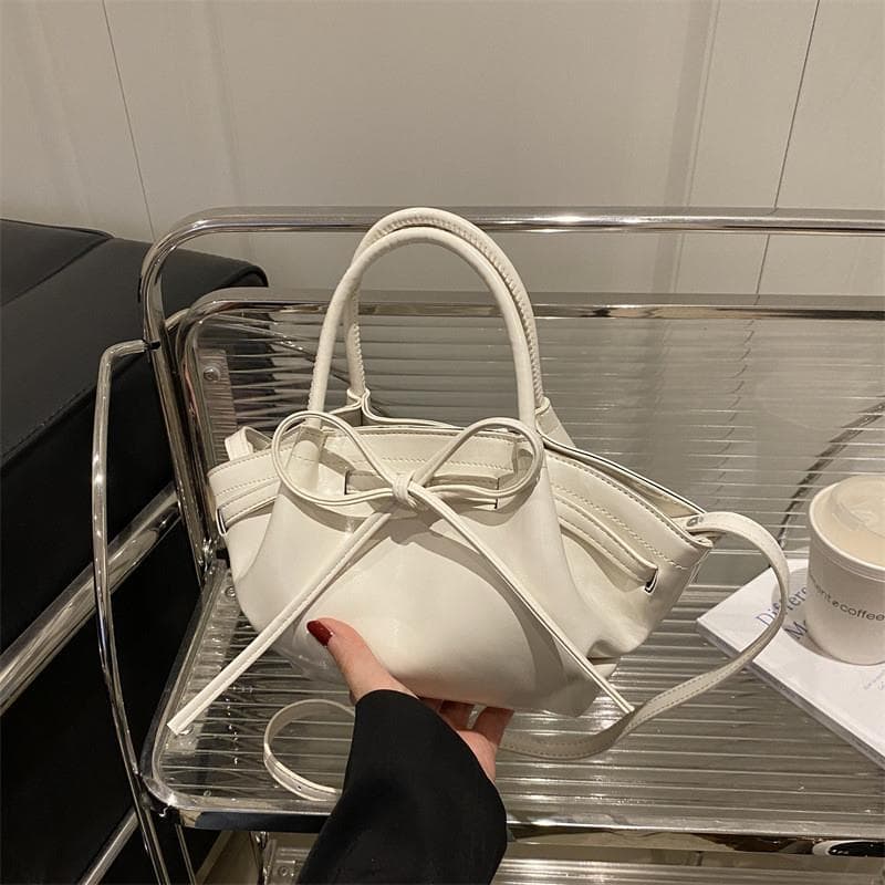Nicho de luxo leve Super quente pequeno saco feminino 2025 novo estilo verão um ombro axila saco High-End sentido Cross-