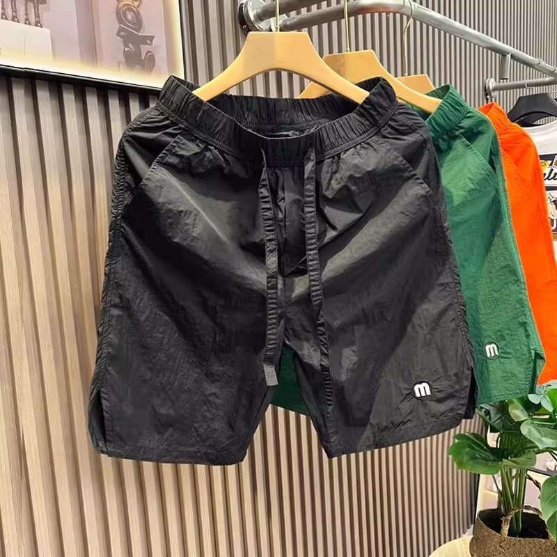 2026 novo estilo de seda gelo legal sentimento quarto Shorts masculino verão Casual solto esportes estilo fino calças de