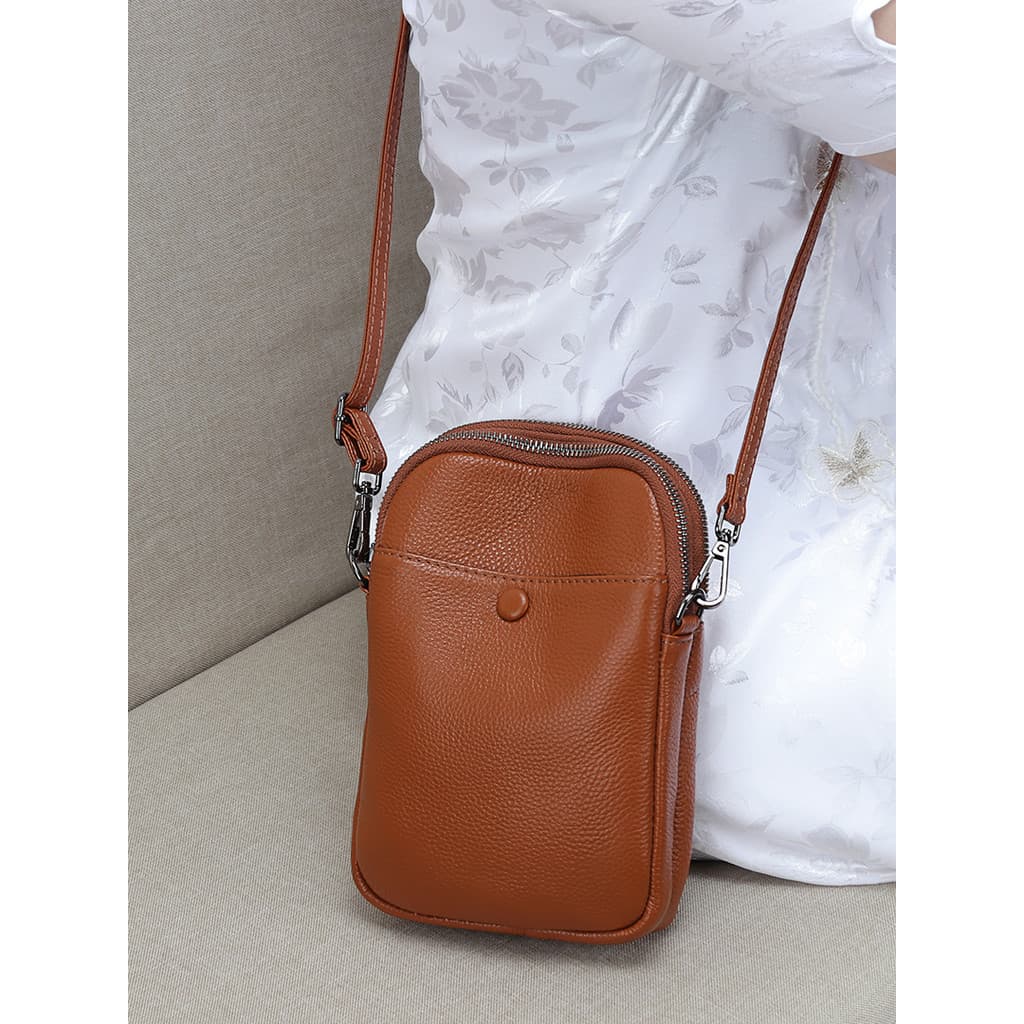 Primeira camada de couro pequeno saco feminino mensageiro Mini telefone móvel 2026 novo estilo moda na moda All-Match co