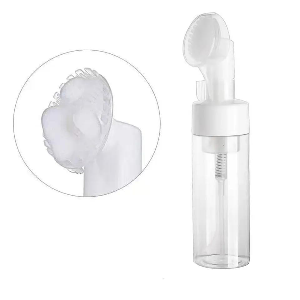 Frasco com bomba de espuma para limpeza facial e escova de limpeza, adequados para a limpeza do rosto.