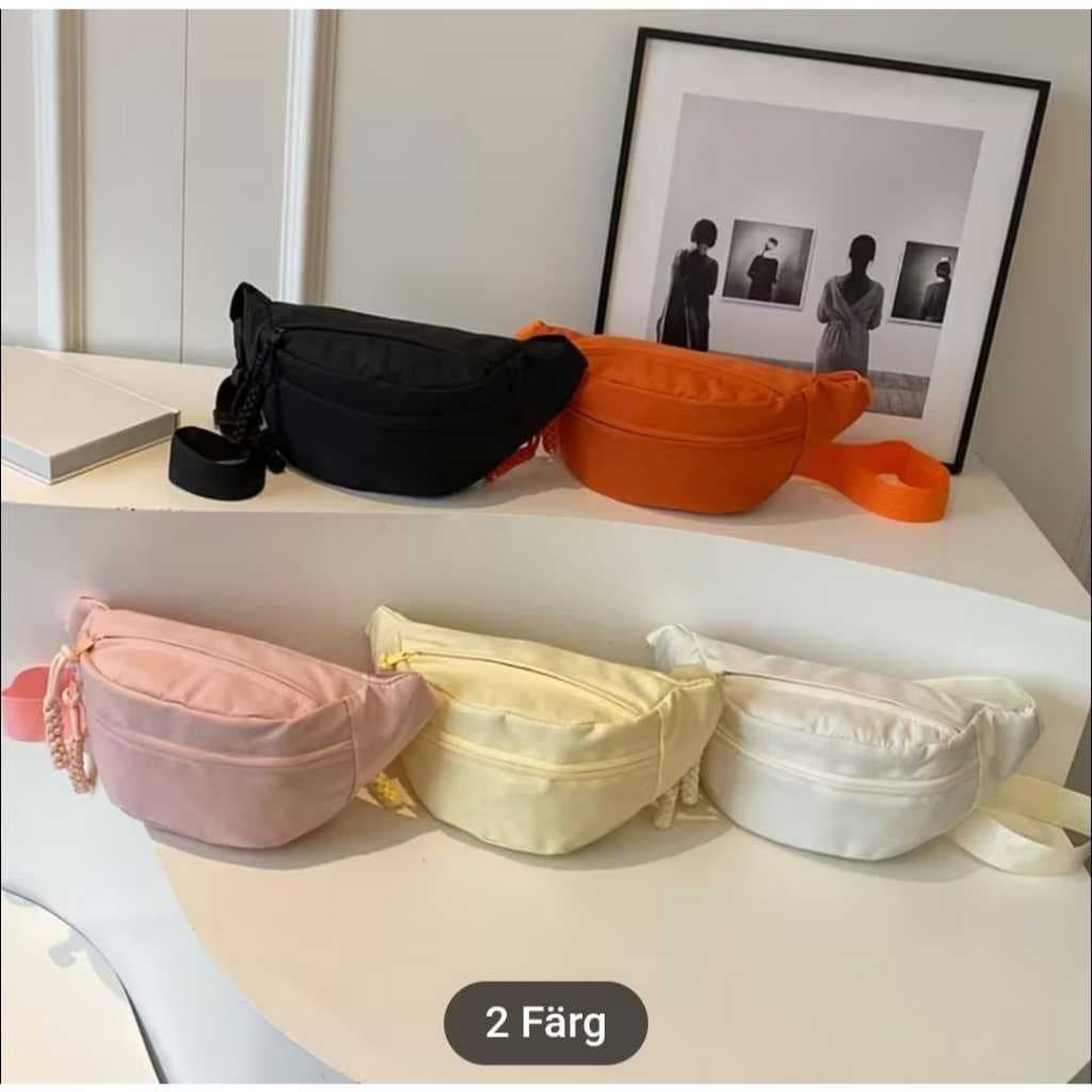 pochete feminina de nylon leve, zíper, vários compartimentos, elegante, prática para uso diario