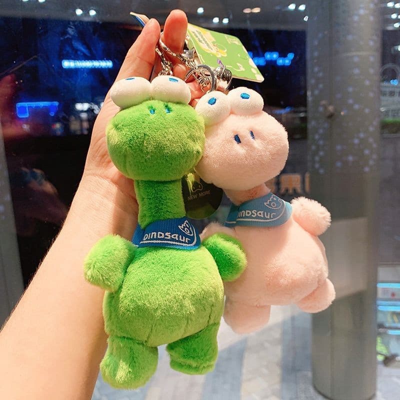 Novo produto pronto estoque grande olho dinossauro criativo pingente boneca dos desenhos animados mochila de pelúcia bon