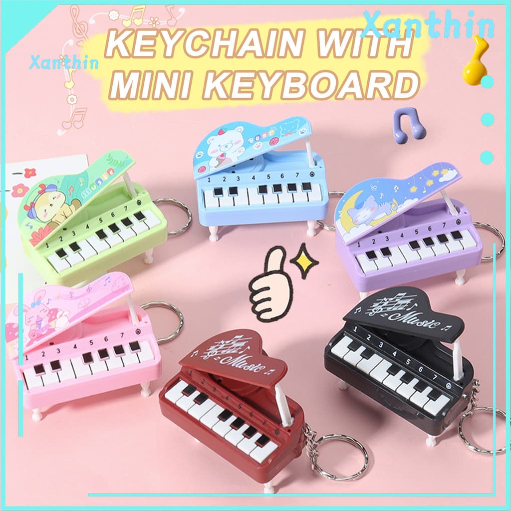 Kids Mini Piano Eletrônico Brinquedo Música Interativa Bolsa Portátil Decoração Pendurado Pingente Chave
