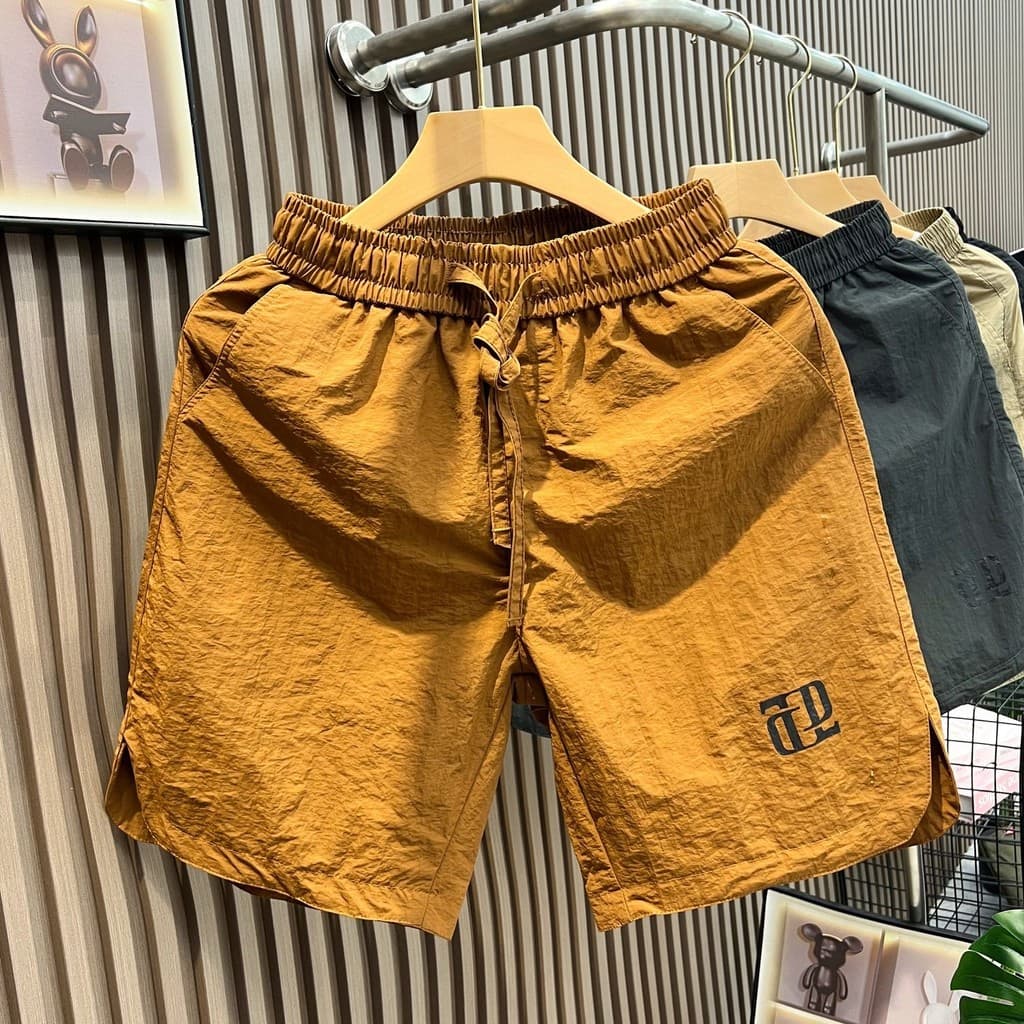 Comércio exterior corte etiqueta Shorts de seda gelo masculino Street Wear verão estilo fino calças de cinco pontos solt
