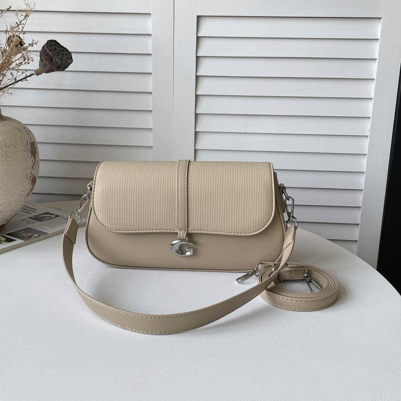 Uma bolsa tiracolo de ombro único de design novo e extremamente popular, uma bolsa quadrada de mão e uma bolsa feminina
