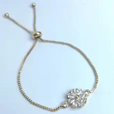 Pulseira Dourada com Design Regulável Detalhe Tipo Flor Cravejada com Zircônias Redondas e Gotas Bolas (11cm)