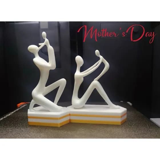 Escultura mãe e filho