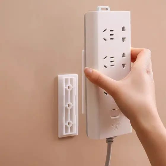 Suporte Adesivo Fixador Parede  Suporte fixador de Parede com adesivo Multiuso para Controles Remotos, Réguas de Tomada,