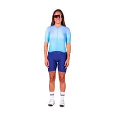 Macaquinho Triathlon c/ manga Woom 140 Fem Azul