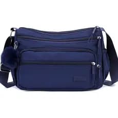 Bolsa Feminina Casual Transversal Prática e Estilosa com Pompom Decorativo