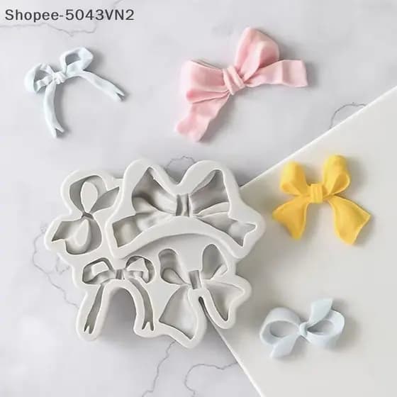 [RE] 1 Pcs 4 Buracos Arco Bowknot Silicone Bolo Molde De Cozimento Sugarcraft Chocolate Cupcake Fondant Ferramentas De D