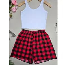 Shorts Feminino Xadrez > Conforto e Estilo para o Dia a Dia O Shorts Feminino Xadrez é perfeito para quem busca conforto