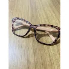 óculos zoom automático modelo feminino onçinha