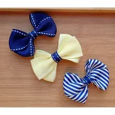 trio de laços infantil, 3 laços nas cores azul marinho, amarelo e listrado.