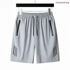 Verão americano High Street Shorts masculino esportes praia calças soltas casuais calças de basquete respirável sentido