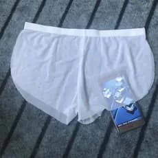 2026 novo estilo transparente roupa interior masculina Ultra-fina malha casa Shorts malha seta calças legal pijama juven