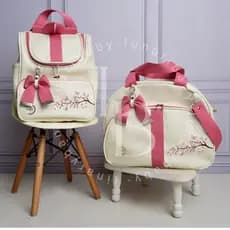 Bolsa Maternidade kit 2 peças menina e menino mala e mochila multifunção impermeável com bordado de flores e leãozinho