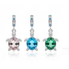 BERLOQUE BANHADO A PRATA TARTARUGA COM CRISTAL AZUL,ROSA OU VERDE