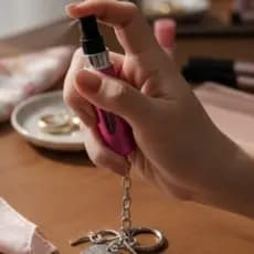 CHAVEIRO PORTA PERFUME EM PLÁSTICO E METAL, 8CM, 5ML