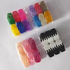 Pacote com 12 Piranhas tridente prendedor de cabelo cores preta e transparente.