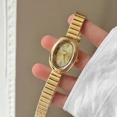 Relógio Oval Dourado Naidu New Bathtub para Mulheres, Relógio Feminino de Moda Simples e de Alta Qualidade