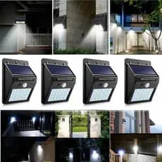 Kit 4 Luminária Parade Led Arandela Solar Iluminação Muro Jardim Garagem Exterior Sensor Prova Dágua