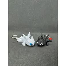 Boneco Chaveiro Dragão Banguela articulado - Fúria da Luz - Furia da noite Como treinar o seu dragão
