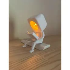 Luminária Decorativa Bonequinho LED Chama de Vela Abajur Criativo Amiguinho Sentado Luz Quente Quarto Mesa Escrivaninha