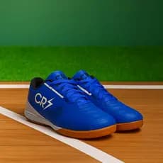 Chuteira CR7 Quadra – Performance e Aderência no Futebol Society