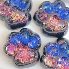 Brinquedo Antiestresse de Cristal com Efeito Brilhante Aurora em Forma de Pata de Gato.
