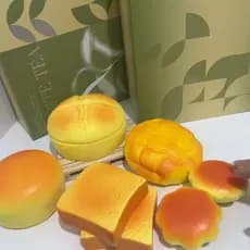 Pão realista de recuperação ultra-lenta com aroma leitoso, um brinquedo macio e pegajoso para alívio do estresse U9LV.