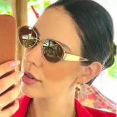 Óculos de sol femininos em estilo europeu e americano, com lentes ovais retrô e armação de metal