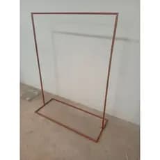 arara ilha cabideiro centro de loja cor vermelho cobre