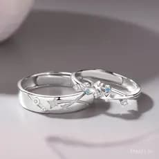 Vem com alguns anéis de estrela para homens e mulheres, um par fresco com chuva de meteoros cravejada de diamantes.
