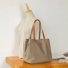 Bolsa feminina 2026 nova bolsa de alta capacidade, bolsa de ombro, bolsa de lona, bolsa de mão.