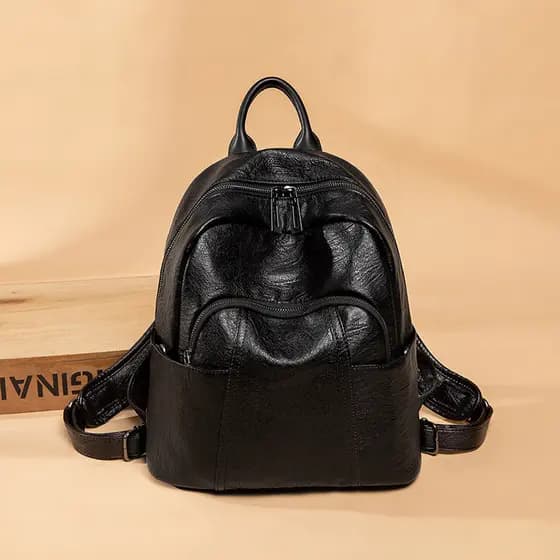 Mochila feminina 2026 nova mochila de couro macio de grande capacidade, bolsa de viagem minimalista de moda.