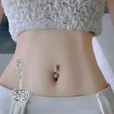 Piercing de Umbigo em Titânio com Coração Branco - PARATA E DOURADO